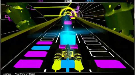 Audiosurf – Hypnoottinen Musiikkilautapeli 3D-Taistelulla!